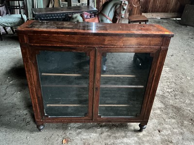 Lot 5354 - Regency rosewood and burr wood crossbanded pier cabinet, enclosed by two doors on spool feet, 104cm wide 29cm deep x 98cm high