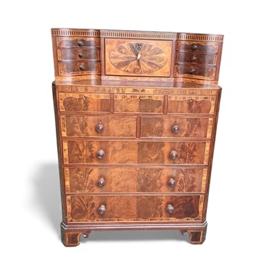 Lot 1309 - Good quality early 20th century mahogany, satinwood and kingwood inlaid chest of drawers with concave superstructure of short drawers about central compartment, three flush frieze drawers and tw...
