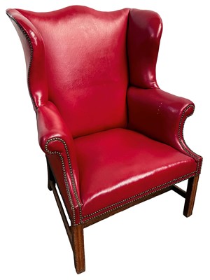 Lot 1405 - 19th century mahogany framed wing armchair with studded red leather upholstery