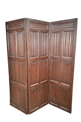 Lot 1409 - Antique oak three fold screen, each section with linen-fold panels, 185cm high