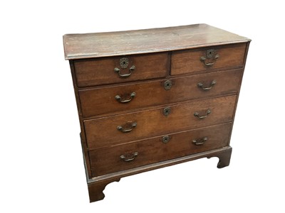 Lot 1311 - Early 18th century oak chest of two short over three long graduated drawers on bracket feet, 104cm wide x 54cm deep x 104cm high