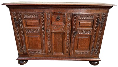 Lot 1403 - Good 17th century Continental carved oak cupboard