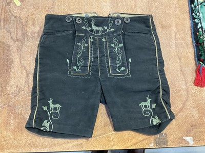 Lot 5130 - Children's pair of embroidered lederhosen, and two wall hangings