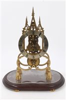 Lot 653 - 20th century brass framed Cathedral skeleton...