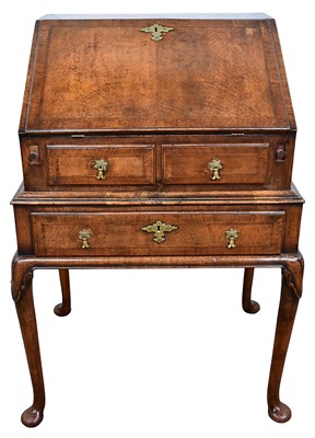 Lot 1264 - Good quality George I style walnut crossbanded and feather strung bureau on stand