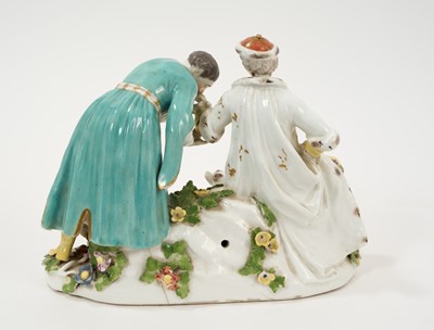 Lot 26 - Continental porcelain group, 'The Polish Hand Kiss'