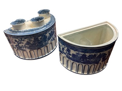 Lot 269 - Two early 19th century English pearl ware bough pots with blue and white printed Chinese landscape decoration