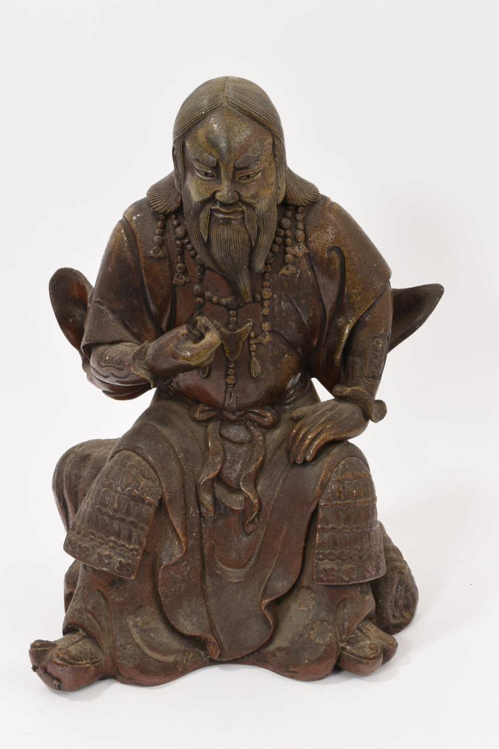 Lot 40 - Chinese bronzed ceramic figure of seated figure