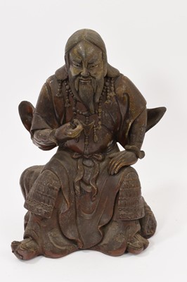 Lot 40 - Chinese bronzed ceramic figure of seated figure