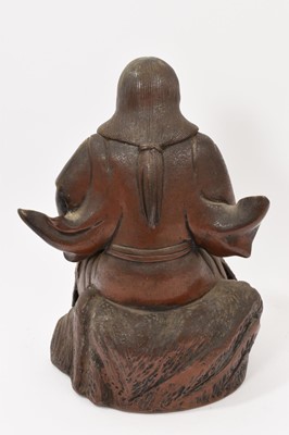 Lot 40 - Chinese bronzed ceramic figure of seated figure