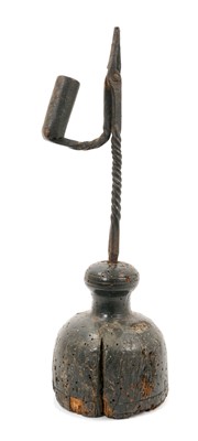 Lot 708 - 17th century wrought iron rush holder, on bulbous base, 32cm high