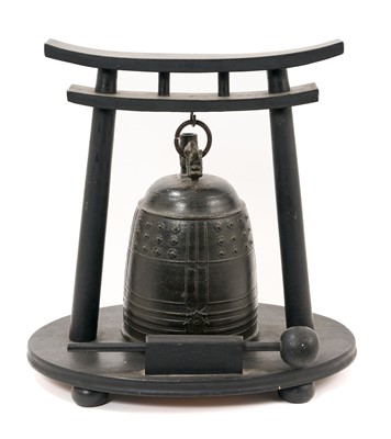 Lot 715 - Antique Japanese bronze temple bell, typical form, 22cm high presented on wooden stand with beater