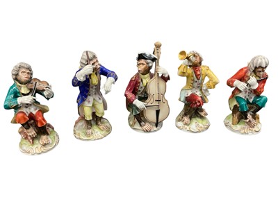 Lot 141 - Meissen-style five piece monkey band