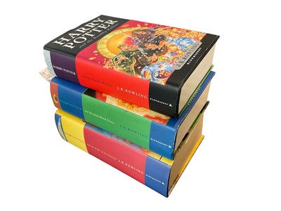 Lot 174 - Three First Edition Harry Potter books to include the Half-Blood Prince with rare page 99 printing error with the misprint 'eleven owls'. Order of The Phoenix and Deathly Hallows (3)