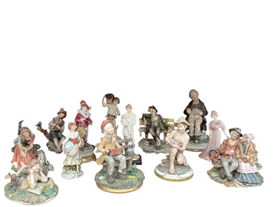Lot 769 - Group of 15 Capodimonte figures including tramps