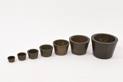 Lot 724 - Set of 18th century bronze stacking weights