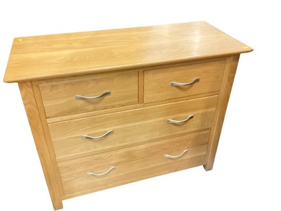 Lot 1307 - Contemporary light oak chest of drawers comprising two short and two long drawers