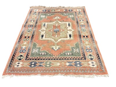 Lot 1402 - Large peach, blue, green and cream rug