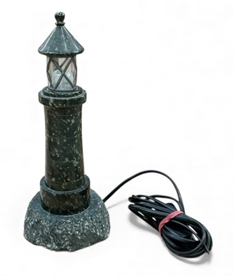Lot 401 - Vintage Cornish serpentine table lamp in the form of a lighthouse.