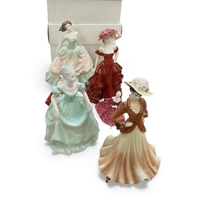 Lot 404 - Group of seven Royal Doulton and Coalport figures, together with a further two boxed Royal Doulton figures (9).