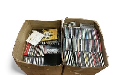 Lot 438 - Two boxes of assorted CD's and DVD's (2 boxes).