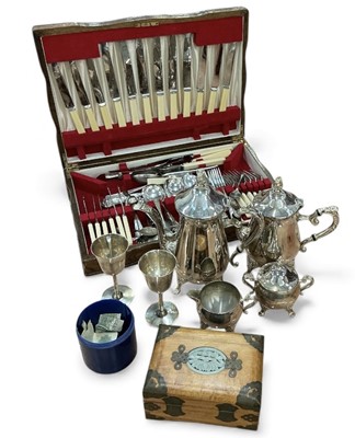 Lot 409 - Canteen of silver plated cutlery, silver plated four piece tea and coffee set and other items including some coins.