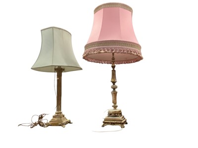 Lot 1331 - Large brass Corinthian column lamp and a gilt and marble lamp (2)