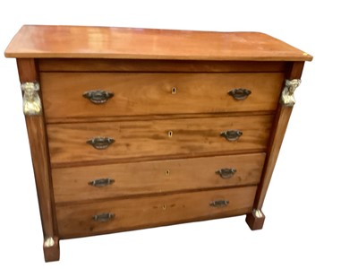 Lot 1320 - Late 19th century French Empire style walnut chest of drawers flanked by pilasters with gilt metal female head mounts, 117.5cm wide, 48cm deep, 98cm high