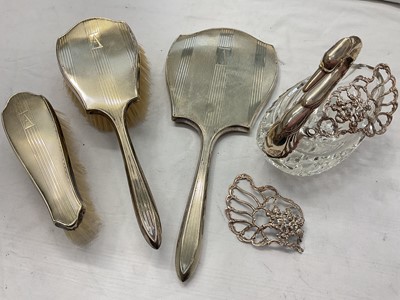 Lot 955 - Silver mounted cut glass swan (broken wing), together with a silver plated dressing table mirror and brush set (4)