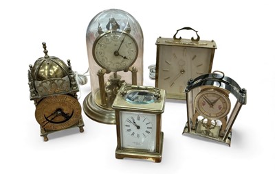 Lot 424 - Early 20th century brass carriage clock with white enamel dial together with four other clocks, (5).