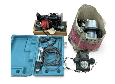 Lot 494 - Two pumps, Singer sewing machine, Bakelite telephone and Makita power tool.