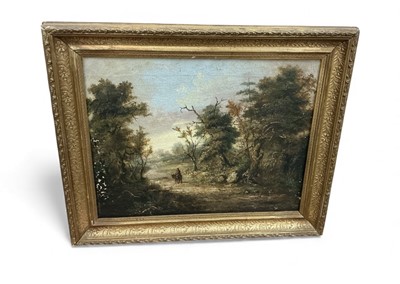 Lot 1142 - 19th century oil on canvas study, figure on a donkey in woodland.