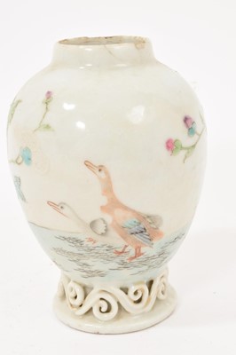 Lot 41 - 18th century Chinese porcelain tea canister, ovoid form with reticulated scroll foot, polychrome painted with ducks and flowers