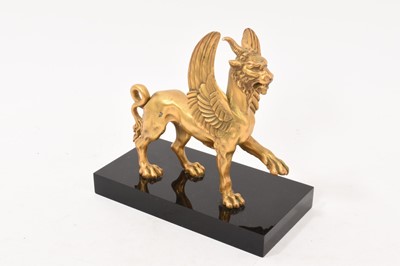 Lot 804 - After the antique, gilt bronze winged lion