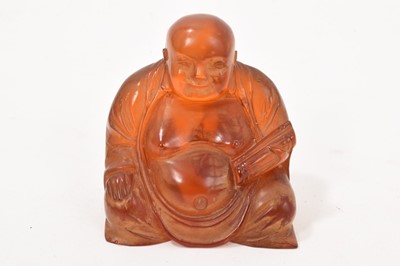 Lot 811 - Chinese carved amber Buddha