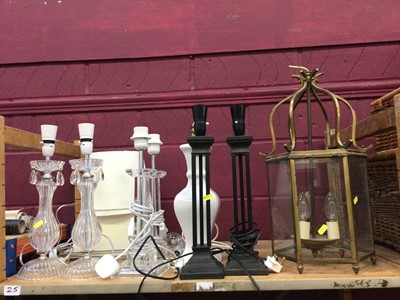 Lot 757 - Brass lantern with glass sides measuring approximately 53cm tall, together with seven other lamps