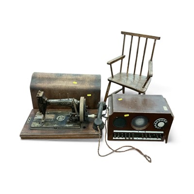 Lot 548 - Children's / Dolls chair, sewing machine and telephone system, (3).