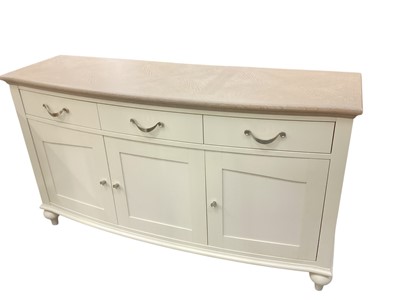 Lot 1369 - Contemporary white bowfront sideboard with three drawers and cupboards below, 154cm wide, 48.5cm deep, 88cm high