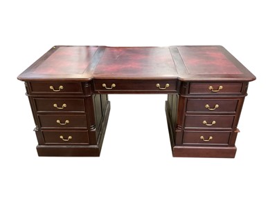 Lot 1372 - Reproduction twin pedestal partners desk with inset leather lined top and nineteen drawers below, 180cm x 90cm x 79cm high