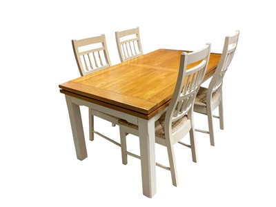 Lot 1384 - Modern extending dining table and set of six ensuite chairs.