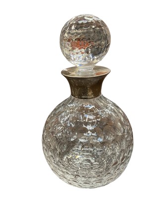 Lot 911 - Large silver mounted globular scent bottle and stopper