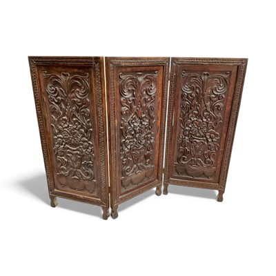 Lot 127 - Carved wood three-fold screen with foliate decoration, and an Eastern carved wood tray