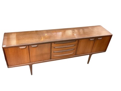 Lot 1376 - Mid century teak sideboard by Younger, 213cm wide, 46cm deep, 79cm high, together with an extending dining table with extra leaf and a set of six dining chairs
