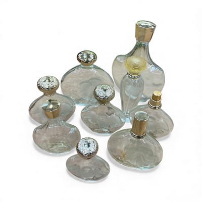 Lot 476 - Collection of nine empty modern Lalique perfume bottles, (9).
