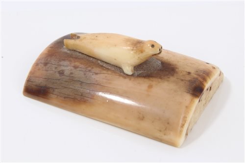 Lot 739 - Small antique Inuit marine ivory carving of a...