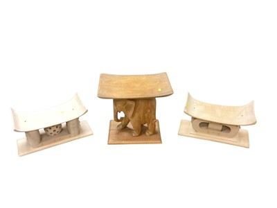 Lot 1390 - African elephant stool, two other stools and other tribal items