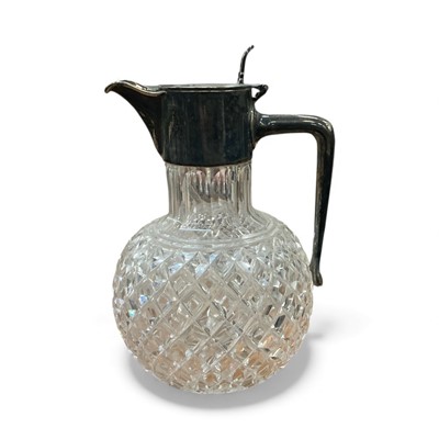 Lot 477 - Victorian silver cut glass claret jug with silver plated mounts.