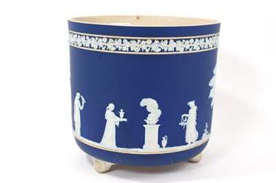 Lot 31 - Large Victorian Wedgwood Jasperware jardinière, raised on three feet, with impressed marks to base- 'Wedgwood England', 23cm in overall height, 24cm in overall diameter.