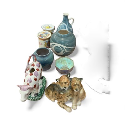 Lot 518 - Early 19th century Staffordshire cow creamer, together with a Wedgwood lustre tea bowl, Karl Ens figure group of lions and other ceramics.