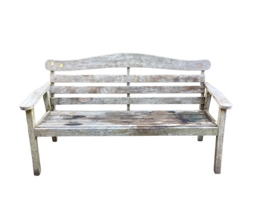 Lot 1392 - Teak garden bench, 159cm wide, 88.5cm high